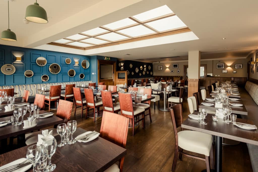 Full dining area set up for dinner in the Lodge restaurant