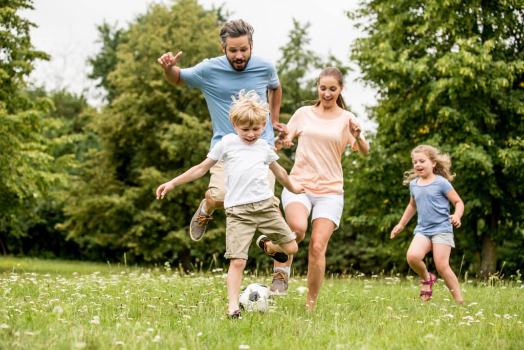 family playing football